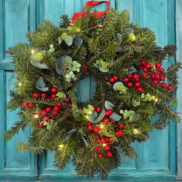 Natural Christmas wreath with light installation