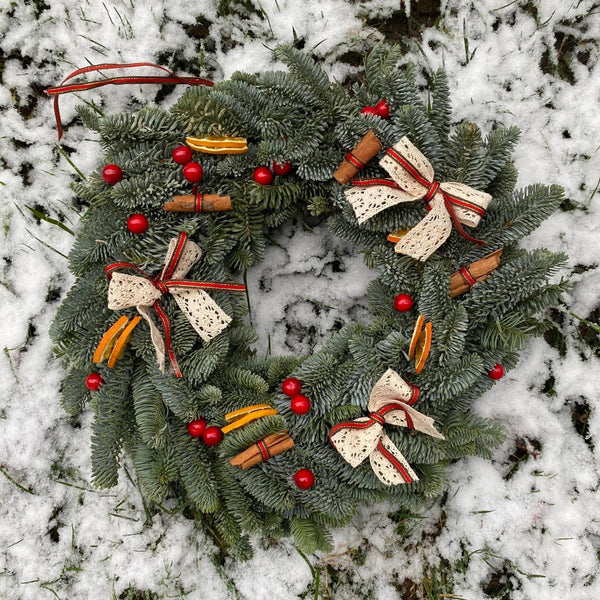 Christmas wreath with bow and cones (silver fir)