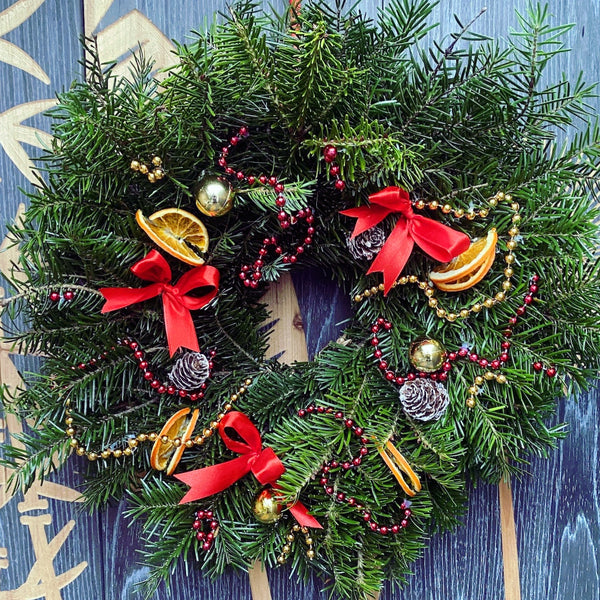 Christmas wreath - orange slices and fir cones