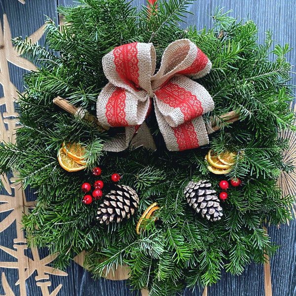 Christmas wreath with natural Christmas tree and decorations