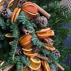 Special fir wreath with dried oranges and cinnamon